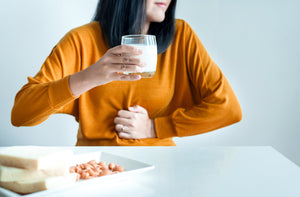 woman consuming food with allergens